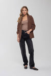 Brown 3/4 ruched sleeve blazer paired with a tan top and black high-waisted jeans, embodying chic Long Island boutique fashion.
