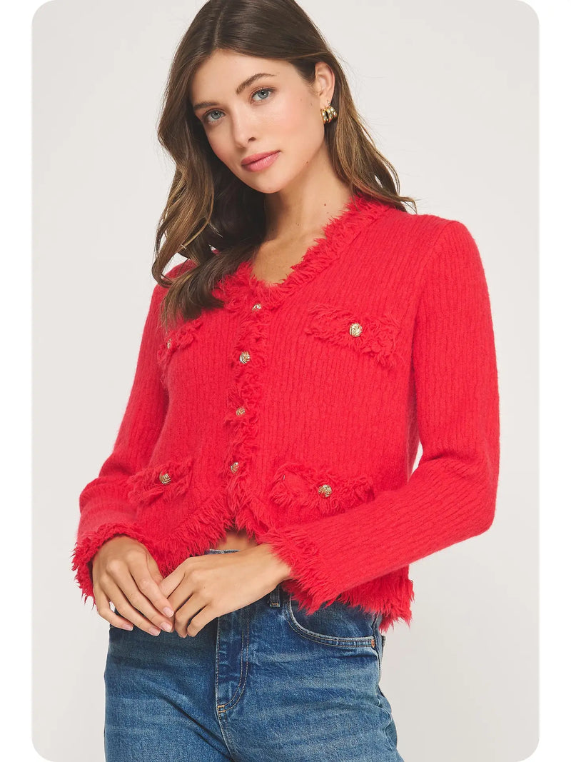 Bright red frayed trimmed textured cardigan featuring a cropped fit, decorative buttons, and front pockets, perfect for Long Island boutique fashion.