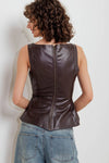 Sleeveless faux leather top in rich brown, featuring a fitted silhouette with a peplum waist and discreet zipper detail, ideal for Long Island boutique fashion.