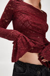 Luxe burgundy lace long sleeve top featuring a fitted silhouette, flared sleeves, and delicate floral patterns, perfect for Long Island boutique fashion.