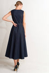 Sleeveless denim midi dress in dark blue, featuring a flattering fit-and-flare silhouette and stylish stitching details for Long Island boutique fashion.