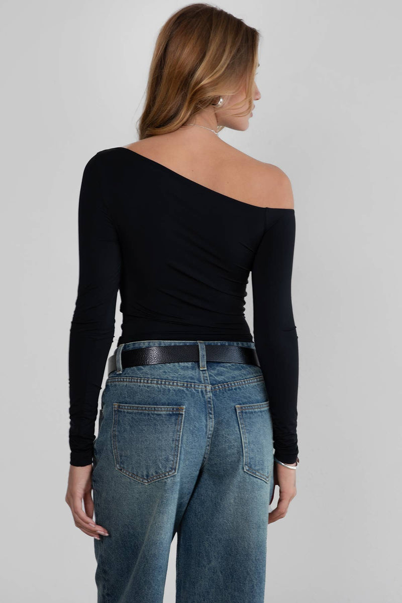 A sleek black one-shoulder top with an asymmetrical neckline and long sleeves, perfect for Long Island boutique fashion styles.