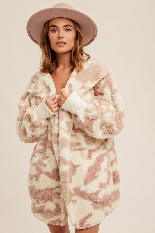 Oversize teddy bear jacket in soft cream and blush camo with a cozy collar and oversized fit, perfect for Long Island boutique fashion.