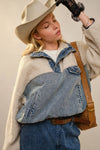 “Cozy sherpa pullover with denim paneling front view”
