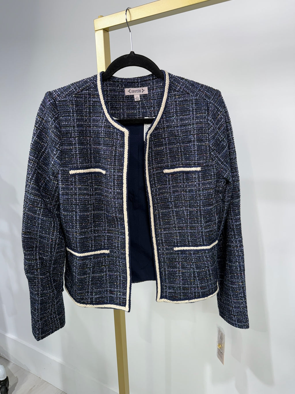 Chic dark navy multi jacket featuring a textured woven design, contrasting trim, and a tailored fit, perfect for Long Island boutique fashion.