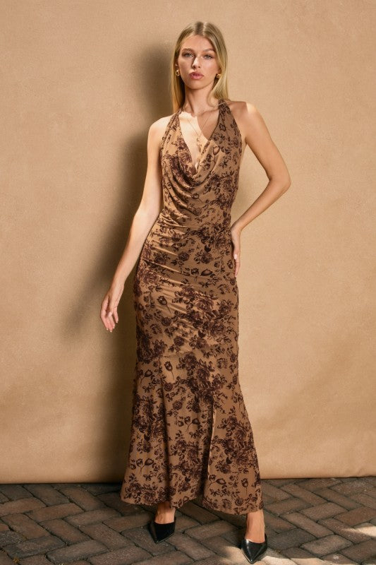 Flowy brown maxi dress with a draped halter neck and floral patterns, perfect for elegant occasions in Long Island boutique fashion.