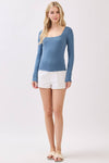 Long sleeve, square neck top in a soft blue hue, perfect for layering, ideal for casual outings in Long Island boutique fashion.