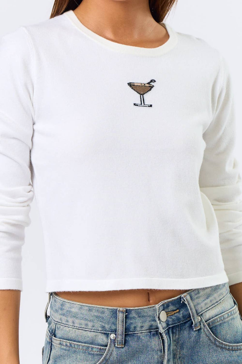 White long sleeve baby tee featuring a playful martini graphic, perfect for casual outings in Long Island boutique fashion.