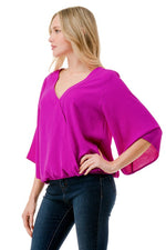 Ariella Surplice Bell Sleeve Top