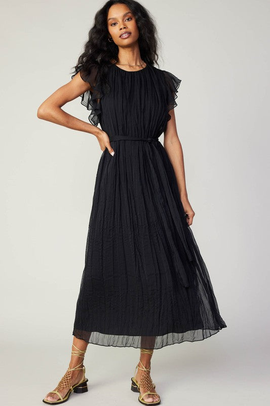Elegant black Flutter Crinkle Dress featuring ruffled sleeves and a belted waist, perfect for Long Island boutique fashion.
