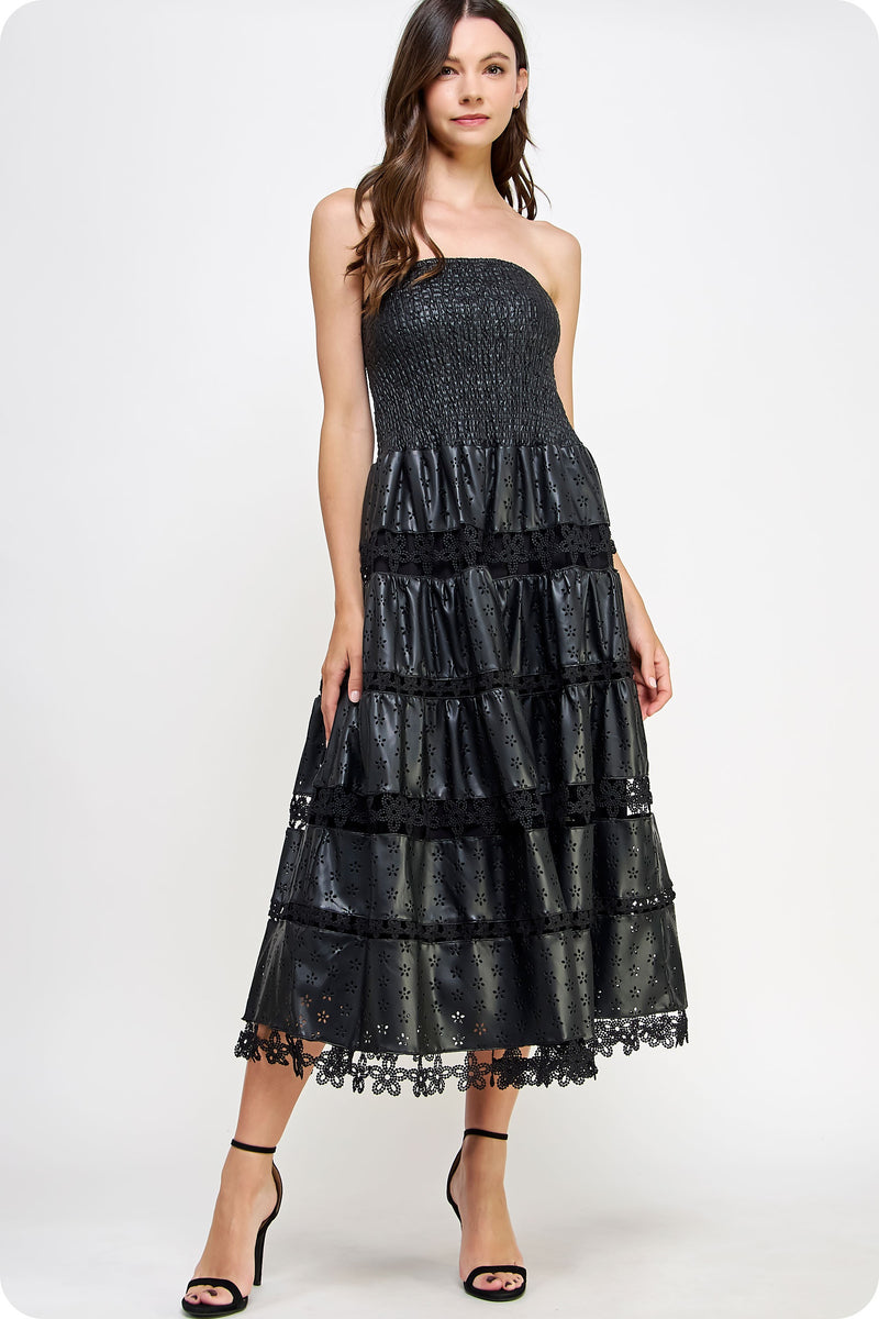 Strapless black eyelet faux leather midi dress with a ruffled tiered design, perfect for Long Island boutique fashion occasions.