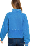 Acid washed blue half zip fleece pullover features a kangaroo pocket and relaxed fit, perfect for cozy Long Island boutique fashion.