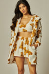 Cozy fleece 3-piece cardigan pajama set in white with brown teddy bear patterns, featuring a cropped top, shorts, and a plush cardigan for comfy lounging in Long Island boutique fashion.