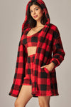 Cozy fleece three-piece pajama set featuring a red and black checkered cardigan, bralette, and shorts, ideal for Long Island boutique fashion.