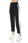 Straight leg two-tone pants in black with a white side stripe, featuring an elastic waistband, perfect for Long Island boutique fashion.