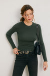 Ribbed crew neck light sweater in deep green, fitted style, perfect for layering in stylish Long Island boutique fashion.
