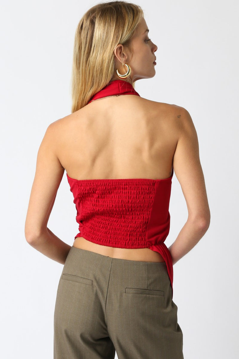 Red Ariana Halter Top featuring a smocked back, adjustable neck tie, and a flattering fit, perfect for Long Island boutique fashion.