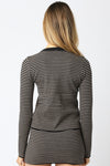 Long-sleeve knit top featuring a slim fit with black and beige horizontal stripes, ideal for stylish layering in Long Island boutique fashion.