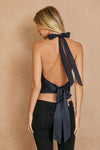 Satin halter neck top in deep navy with an open back and stylish bow detail, perfect for Long Island boutique fashion.