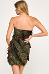 Strapless, olive green ruffle mini dress featuring a floral pattern, perfect for a stylish look at a Long Island boutique fashion event.