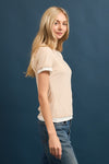 Side view of women’s mesh short sleeve tee with soft lining in nude
