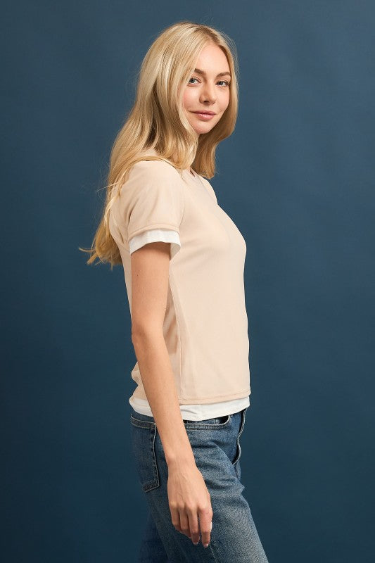 Side view of women’s mesh short sleeve tee with soft lining in nude