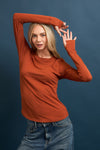 Fitted heavy baby rib top in a warm terracotta hue, ideal for layering within Long Island boutique fashion.