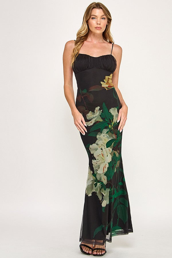 Elegant fitted floral slip dress in black, featuring vibrant floral patterns and a sleek silhouette, perfect for Long Island boutique fashion.