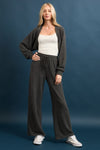 Cozy brushed rib drawstring pants in a rich charcoal gray, featuring a relaxed fit and wide legs, perfect for Long Island boutique fashion.