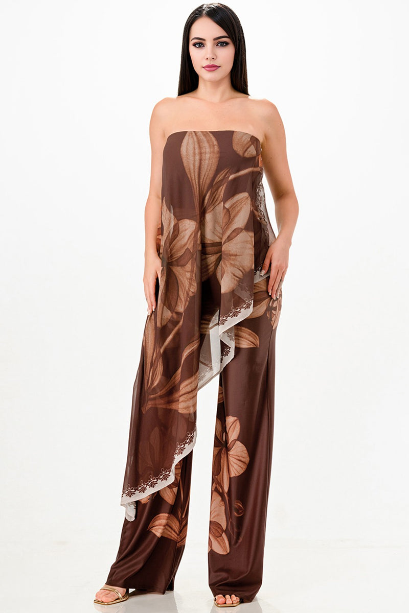 Flowing draped strapless jumpsuit in rich brown, adorned with floral patterns and lace trim, ideal for Long Island boutique fashion.