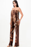 Strapless draped jumpsuit in rich brown with floral patterns, perfect for effortless style at a Long Island women's boutique.
