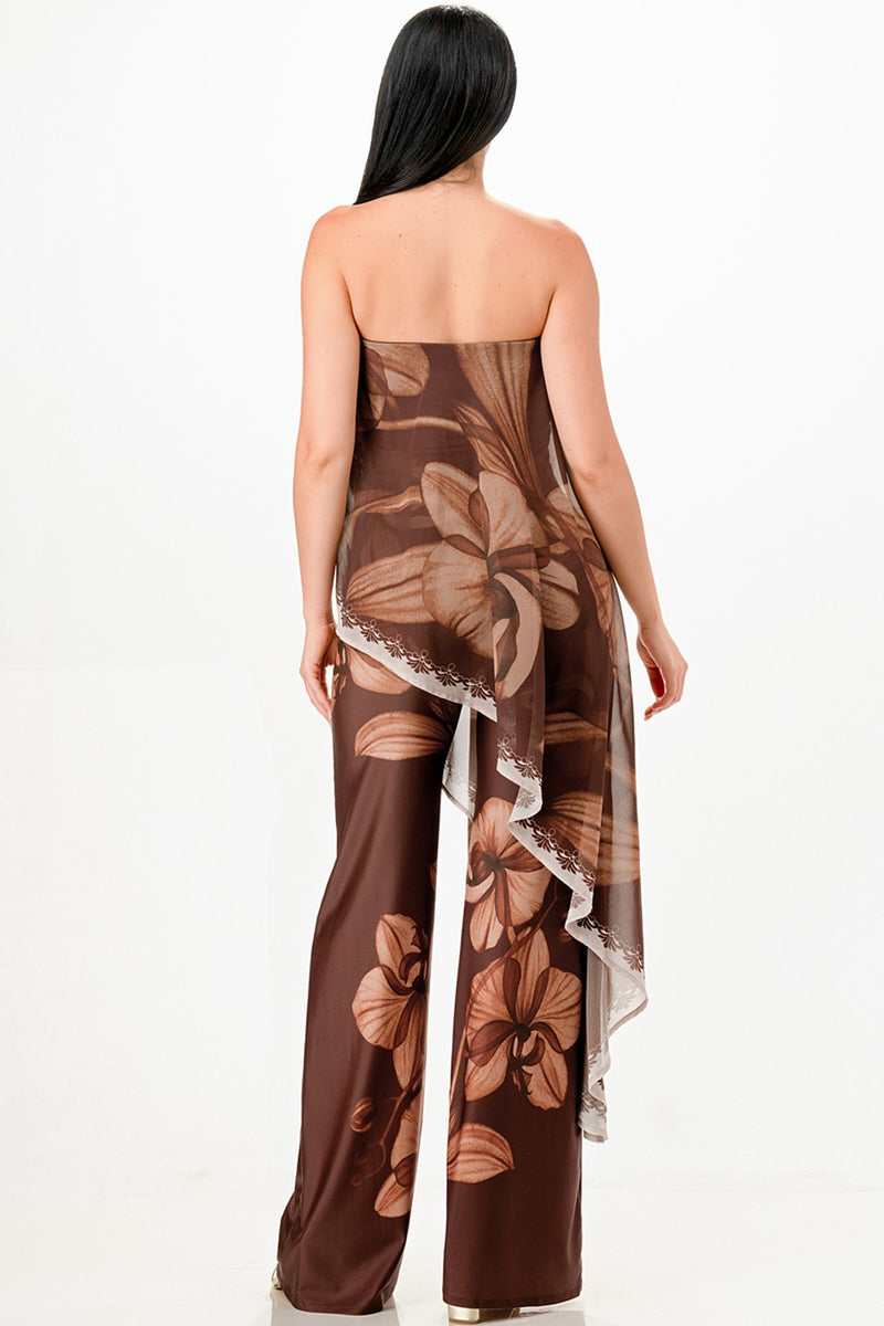 Strapless draped jumpsuit in brown with floral patterns, offering a flattering fit, perfect for Long Island boutique fashion.