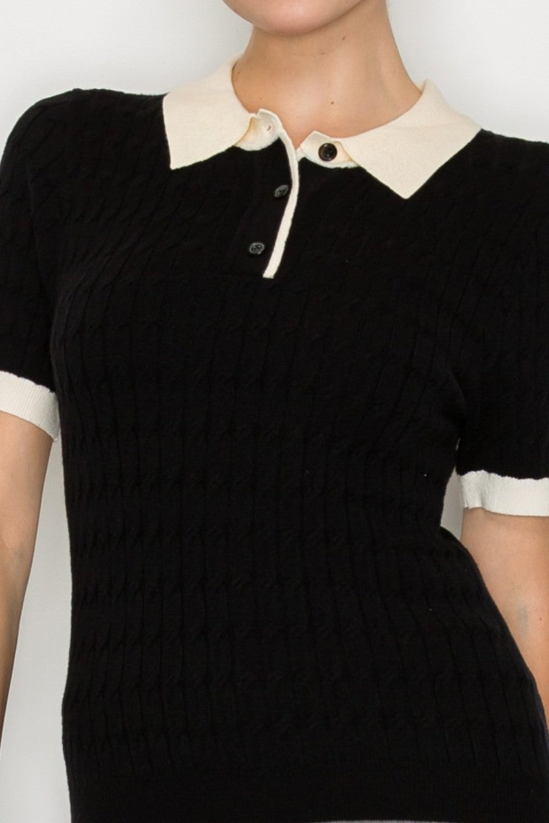 Textured black collar sweater top with a cream collar and short sleeves, ideal for stylish Long Island boutique fashion.