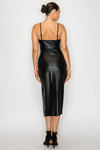 Black faux leather bodycon midi dress with a sultry side slit and adjustable spaghetti straps, perfect for Long Island boutique fashion.