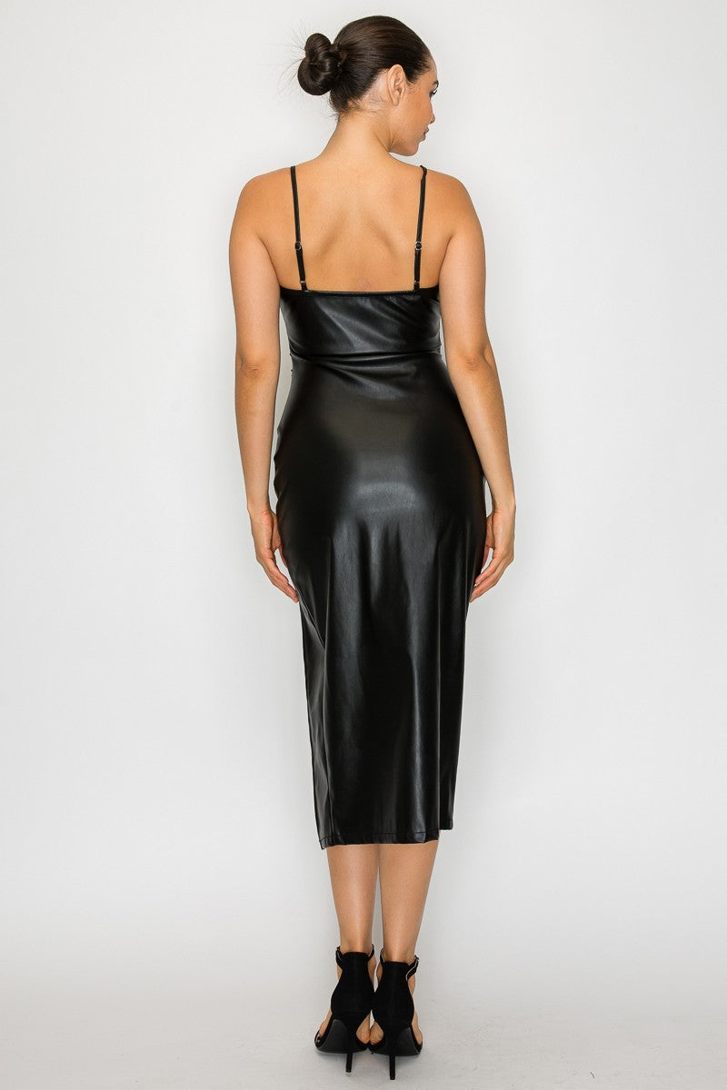 Black faux leather bodycon midi dress with a sultry side slit and adjustable spaghetti straps, perfect for Long Island boutique fashion.
