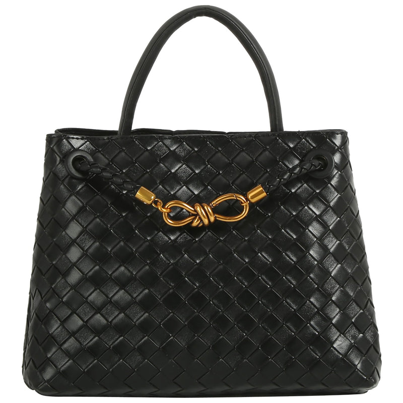 A sleek black woven satchel with a stylish brass knot detail, perfect for a chic outing in Long Island boutique fashion.