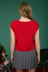 Red cable knit V-neck sweater vest with a stylish side tie, perfect for layering in Long Island boutique fashion.
