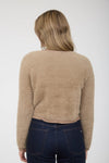 Soft, beige fuzzy knit cardigan featuring gold buttons and a cropped fit, perfect for layering in Long Island boutique fashion.