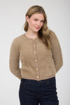 Soft tan fuzzy knit cardigan featuring stylish gold buttons, perfect for adding warmth to any outfit from this Long Island fashion boutique.
