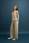 Soft cashmere brushed wide-leg pants in a light gray tone, offering effortless elegance for Long Island boutique fashion.