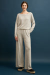 Soft brushed stripe box top paired with wide-leg pants in neutral tones, perfect for relaxed Long Island boutique fashion.