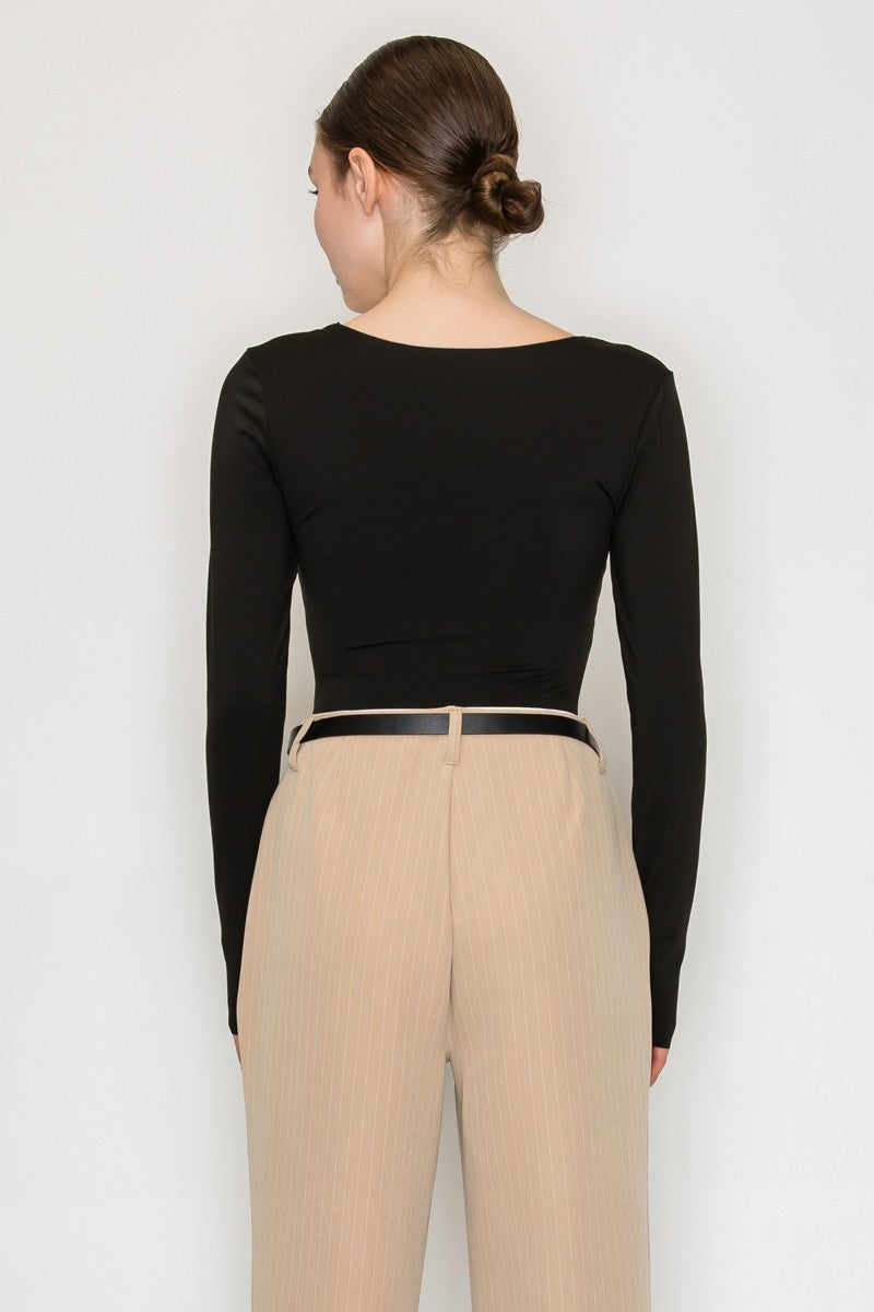 Women’s black square neck long sleeve bodysuit — fitted stretch knit with snap closure, sleek minimalist top available at TandyWear Off Price, Commack NY. back view with pants
