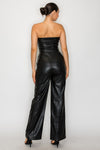Faux leather buttoned tube jumpsuit in sleek black, featuring a fitted bodice and wide-leg silhouette, perfect for Long Island boutique fashion.
