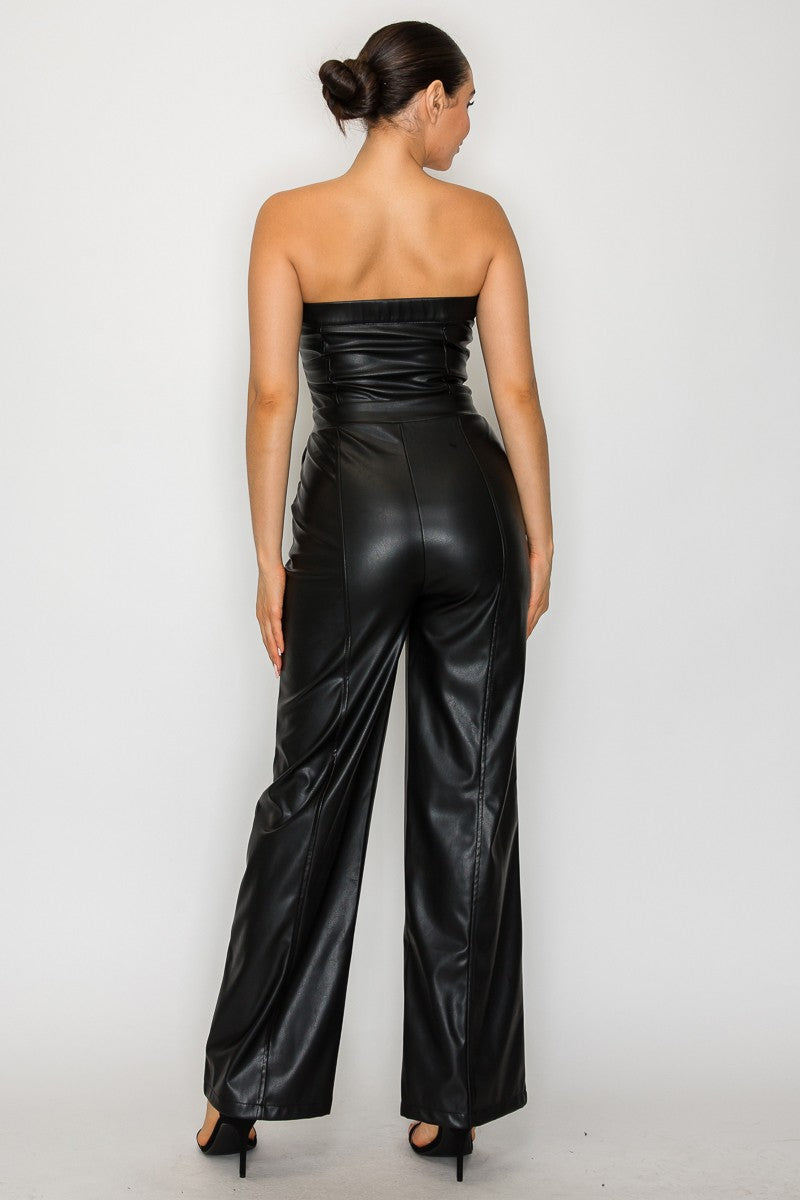 Faux leather buttoned tube jumpsuit in sleek black, featuring a fitted bodice and wide-leg silhouette, perfect for Long Island boutique fashion.