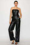 Strapless black faux leather buttoned tube jumpsuit with a tailored fit and wide-leg pants, perfect for Long Island boutique fashion.