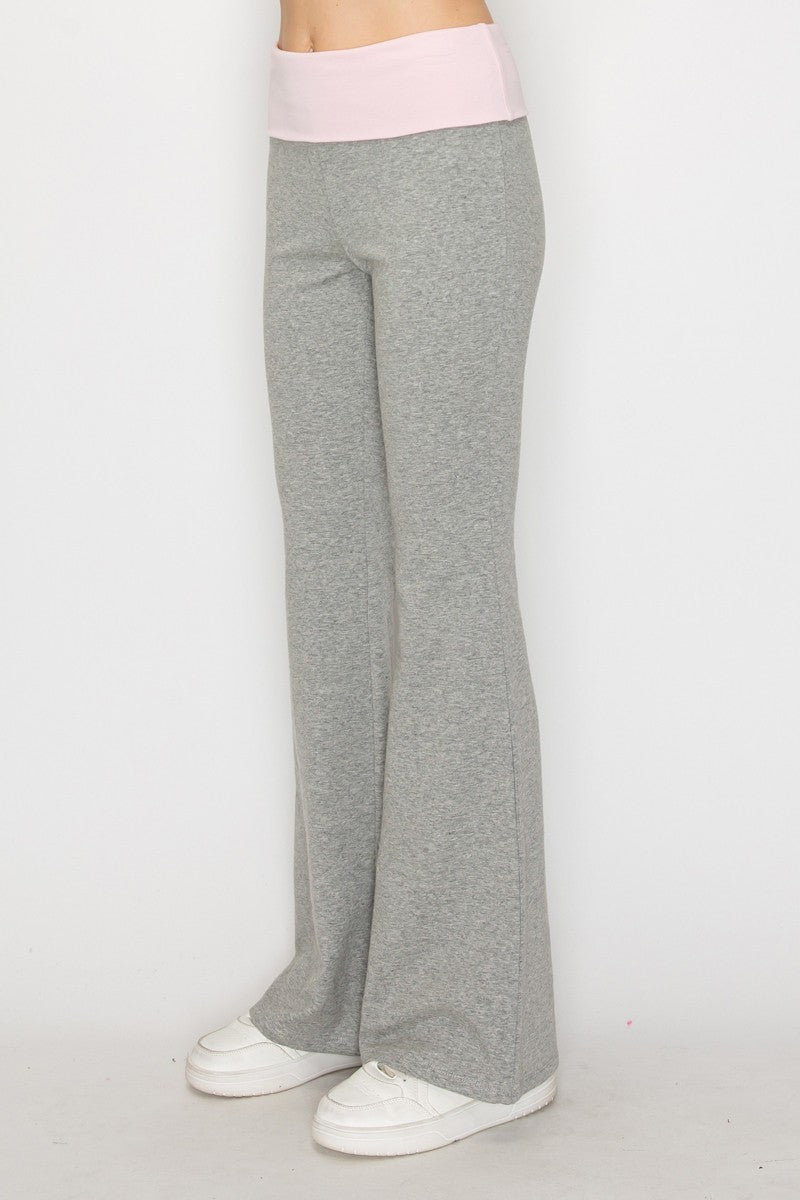Heathered gray fit and flare pants feature a soft pink waistband, perfect for casual and comfortable Long Island boutique fashion.