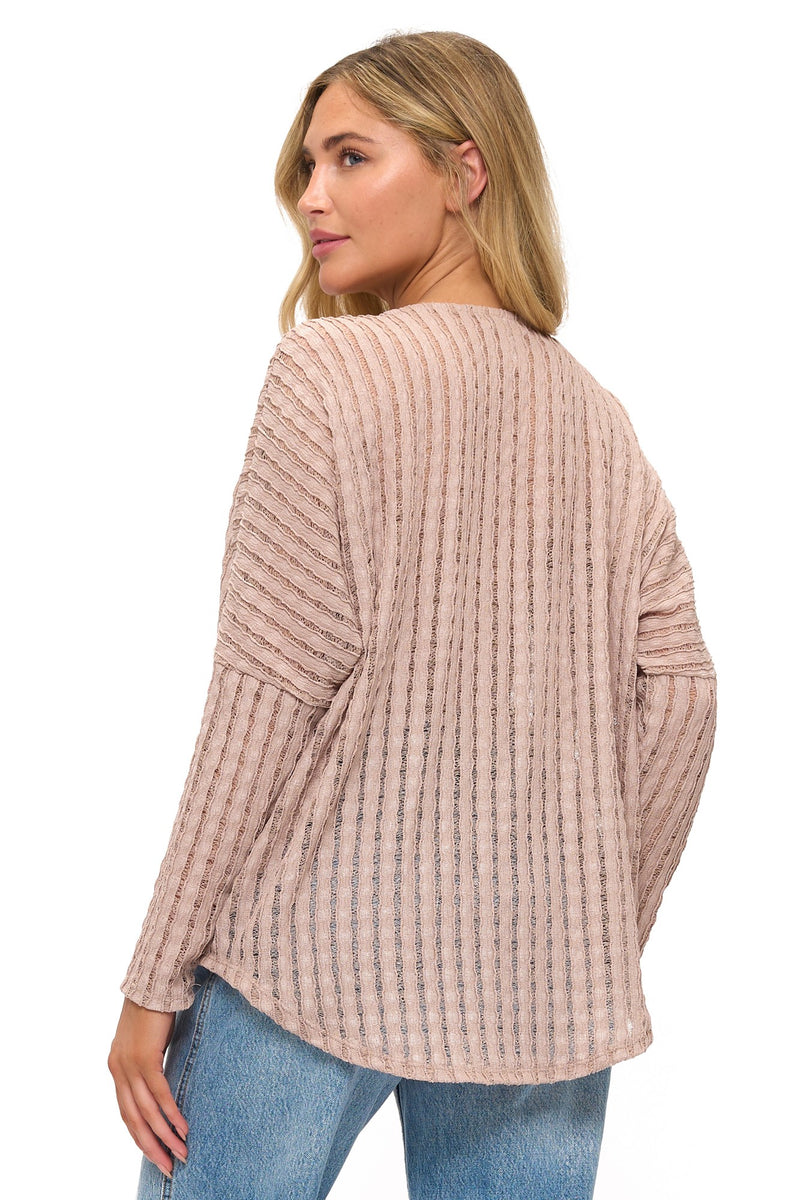 Soft blush dolman sleeve top featuring a textured lace design and a stylish zipper, ideal for casual wear from a Long Island boutique fashion.