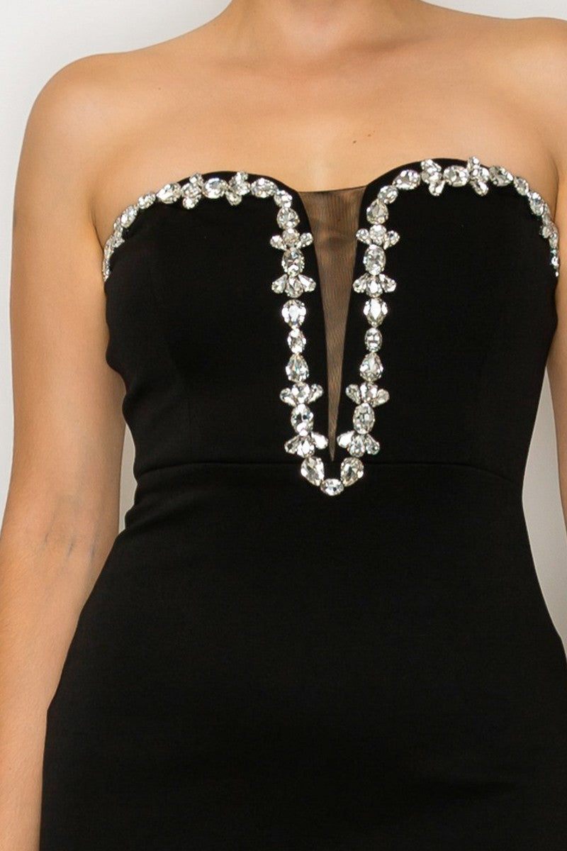 “Black strapless sweetheart mermaid dress with rhinestone detailing”
