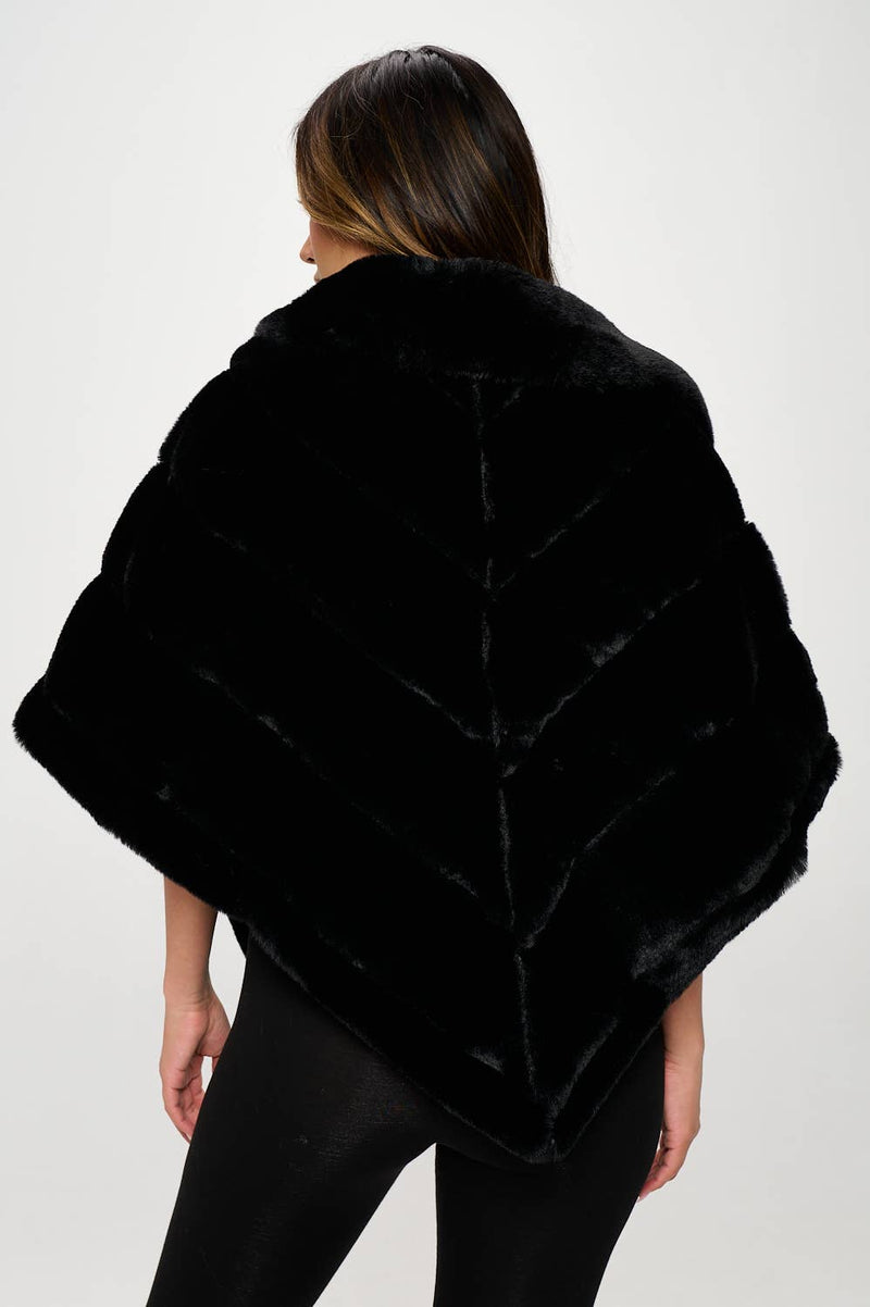 Luxuriously soft black faux fur capelet with a chevron pattern, perfect for layering in Long Island boutique fashion.