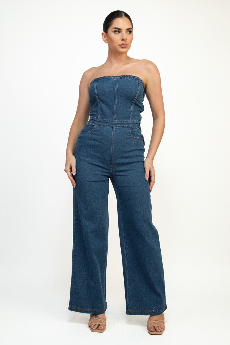 Strapless elastic tube jumpsuit in dark denim with wide leg design and contrasting stitching, perfect for Long Island boutique fashion.